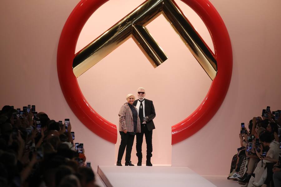 MILAN, ITALY - SEPTEMBER 20:  Italian designer Silvia Venturini Fendi and German fashion designer Karl Lagerfeld acknowledge the applause of the audience at the Fendi show during Milan Fashion Week Spring/Summer 2019 on September 20, 2018 in Milan, Italy.  (Photo by Andreas Rentz/Getty Images)